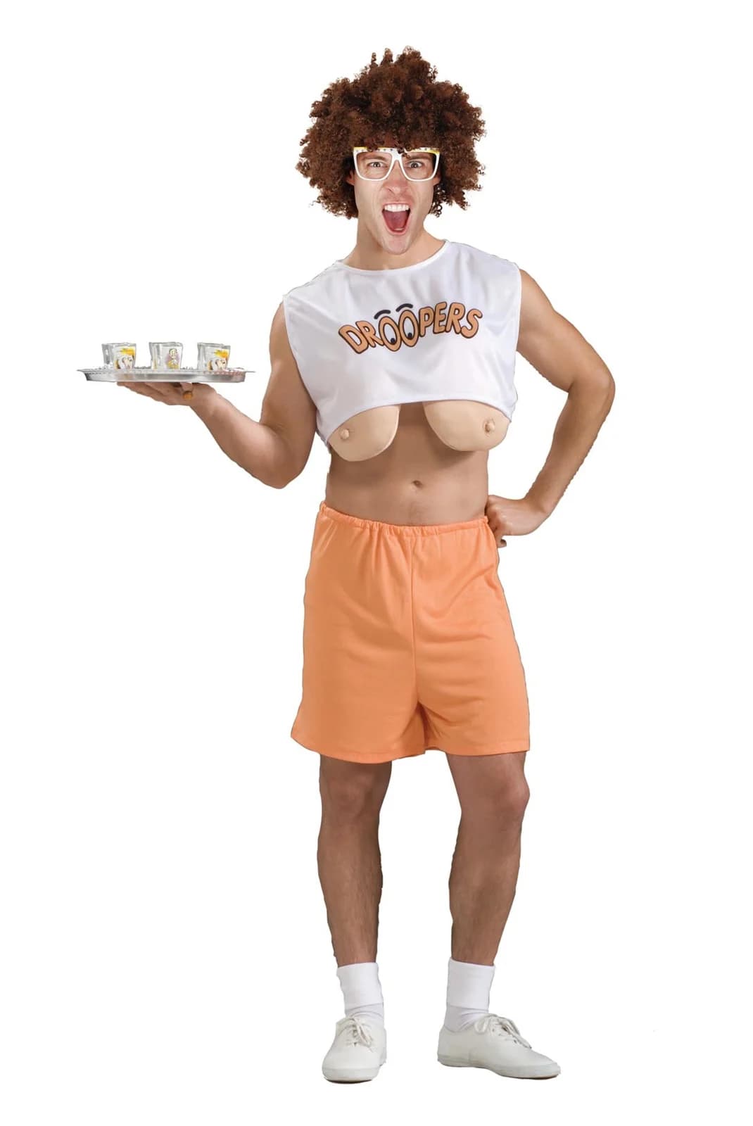 Man in a white Droopers crop top with stuffed novelty boobs and peach shorts