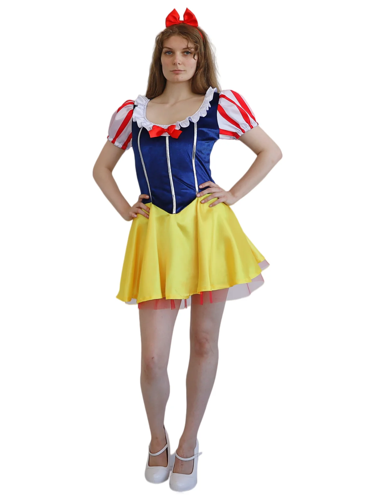 Woman wearing a fairytale dress with navy bodice, striped puff sleeves, yellow skirt and red bow headband